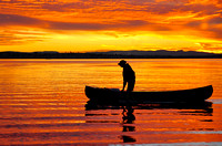Canoeist at sunset